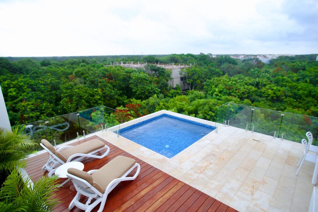 Private plunge pool with jungle canopy views